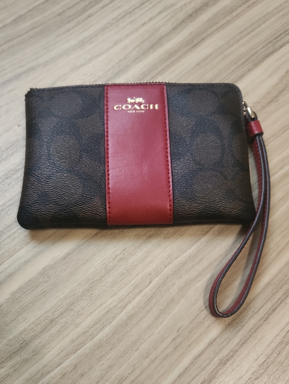Coach Brown Signature Wristlet with Red Center Stripe